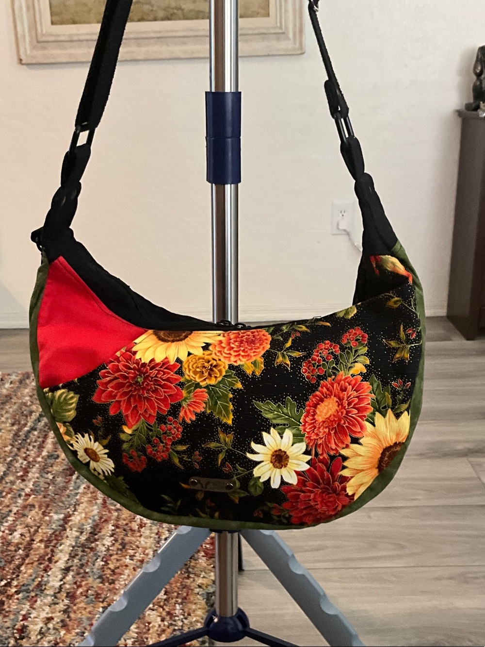 Floral Crescent Shoulder Bag in Black, Red and Green Accents